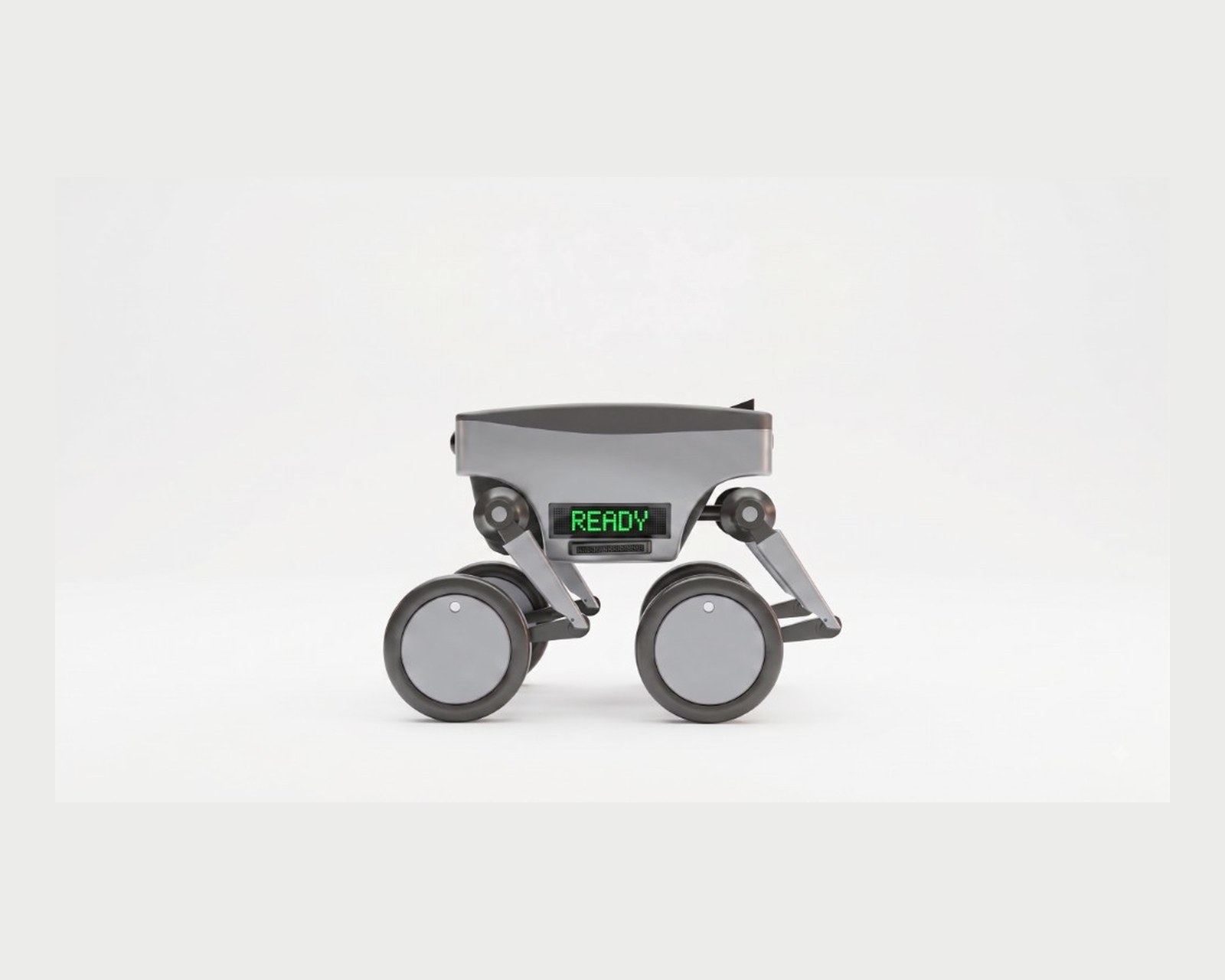 ONYU quadruped side view with READY status screen on the chassis.
